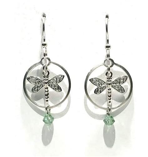 silver forest dragonfly earrings.